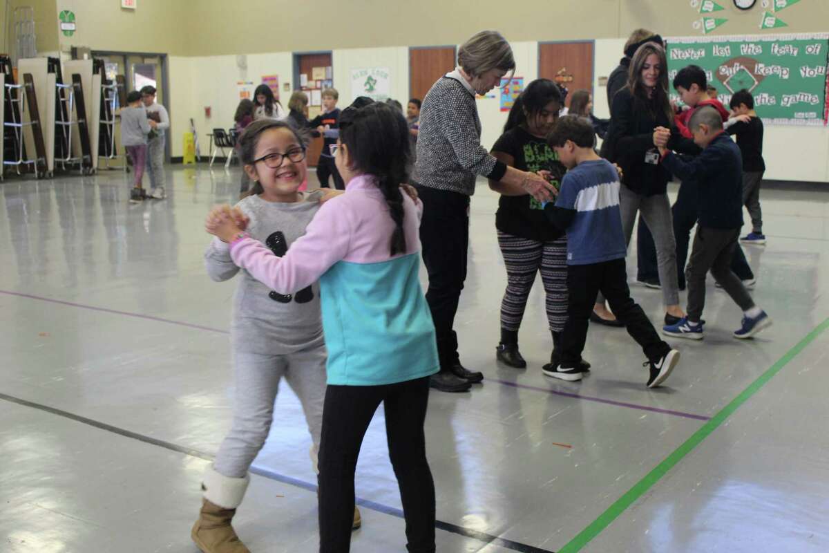 Conroe ISD students learn social skills through ballroom dancing