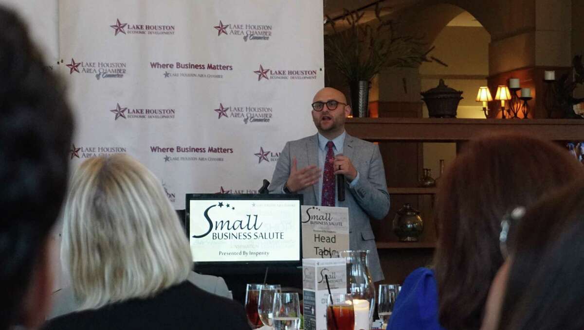 Insperity's Mike Ross speaks at the luncheon Thursday, thanking small-business owners for supporting the community with specialized services and job creation.