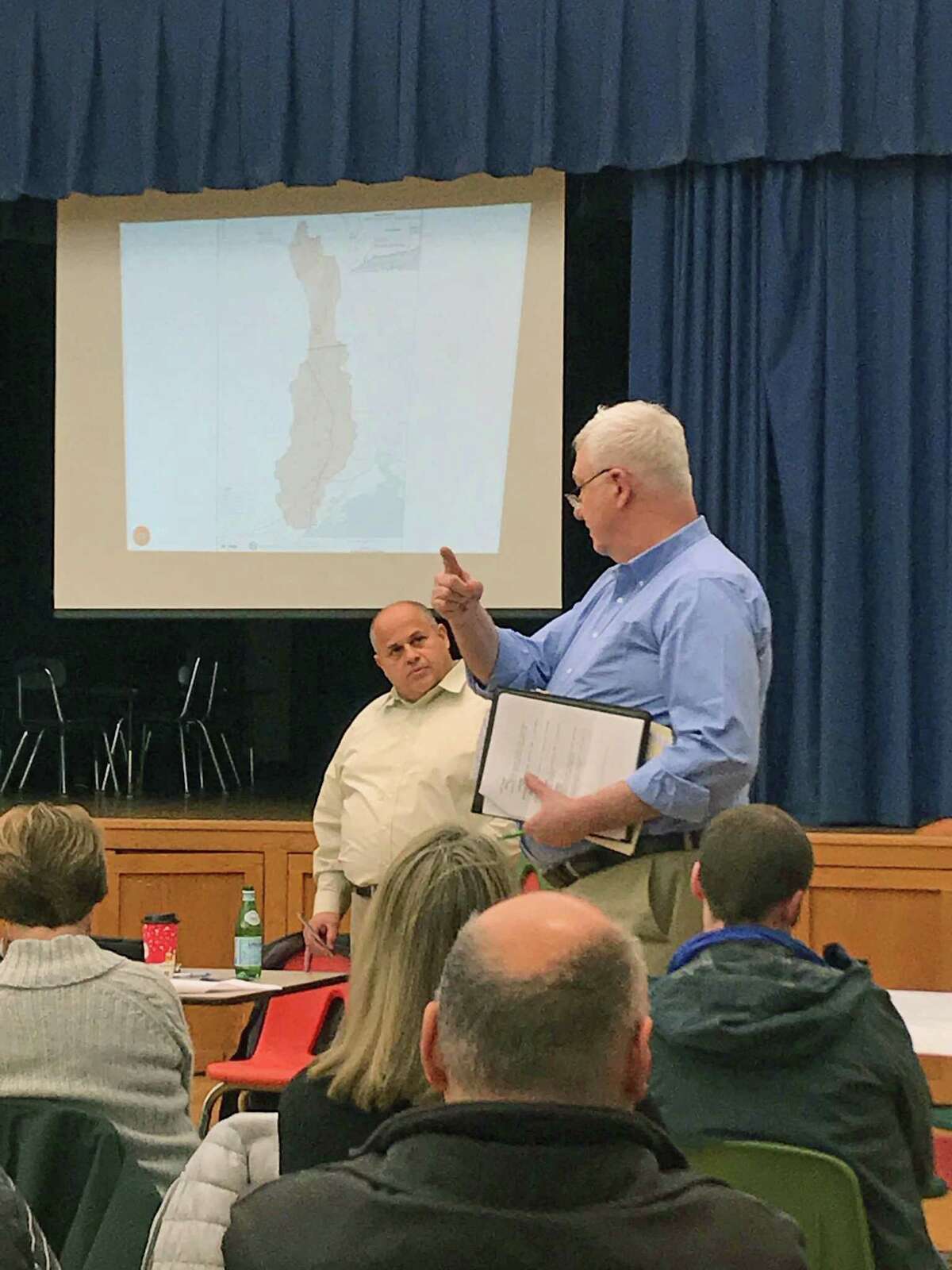 Keith Bradley, of Fairfield, explains struggles with flooding to Fairfield Director of Public Works Joseph Michelangelo at a meeting on Nov. 29, 2018, to discuss the Sept. 25, 2018, storm that flooding many Bridgeport and Fairfield, Conn., residents.