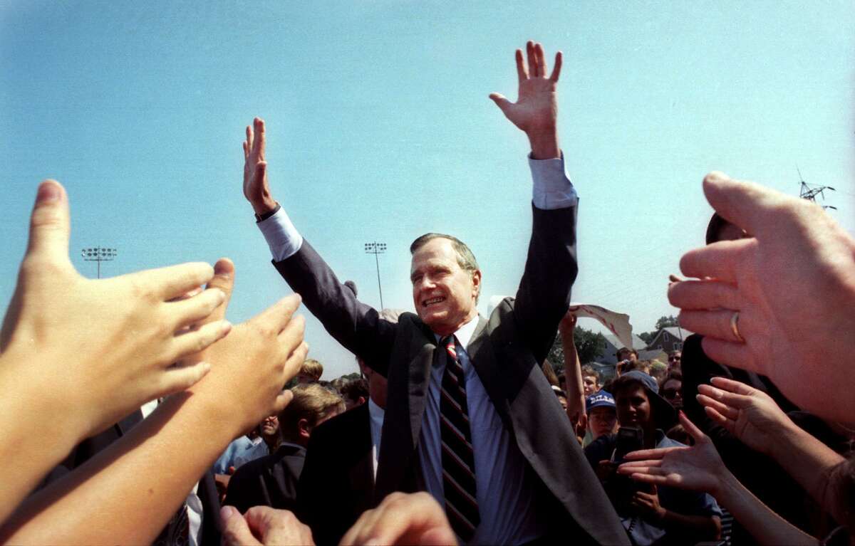 President George H. W. Bush greets the crowd gathered at Nolan Field in Ansonia, Conn. Aug. 24th, 1992.