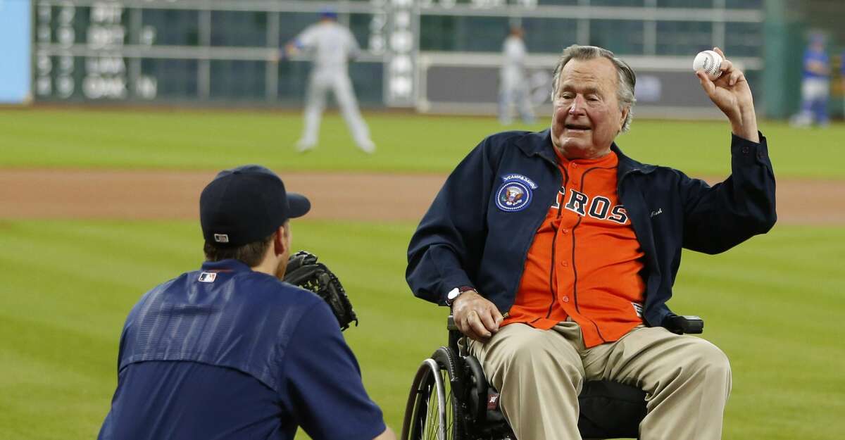 Former President George Bush prepares throws out the first pitch to Houston Astros starting pitcher Collin McHugh during the first inning of an MLB game at Minute Maid Park, Tuesday, April 12, 2016, in Houston. ( Karen Warren / Houston Chronicle )