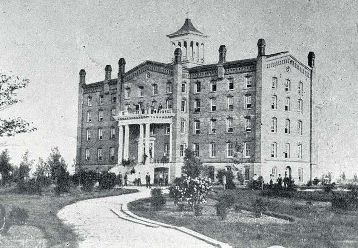 The Old Dormitory, a former seminary, was the first building used by Illinois Industrial University when it opened in 1867. The five-story building, located where the Beckman Institute now stands, was the largest building in the twin cities and was dubbed the “Elephant.” It was torn down in 1881.
