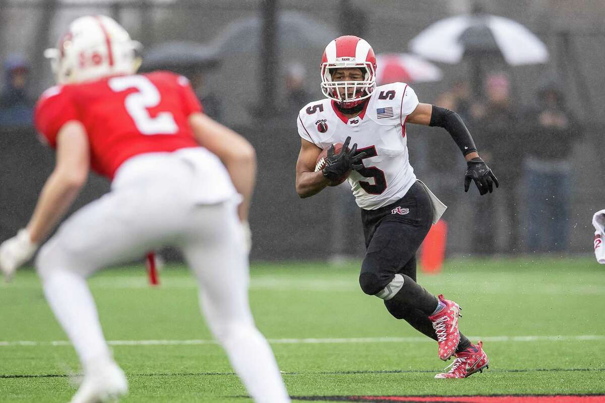 J.R. Moore (5) of New Canaan runs the ball up field during a football game between New Canaan and Fairfield Prep on December 2, 2018 at Fairfield University in Fairfield, CT.