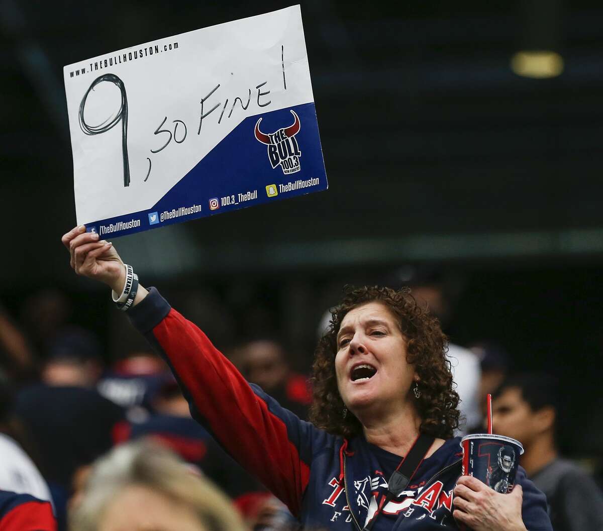 A Houston Texans fan holds up a sign signifying the Texans ninth consecutive win, a 29-13 win over the Cleveland Browns at NRG Stadium on Sunday, Dec. 2, 2018, in Houston.