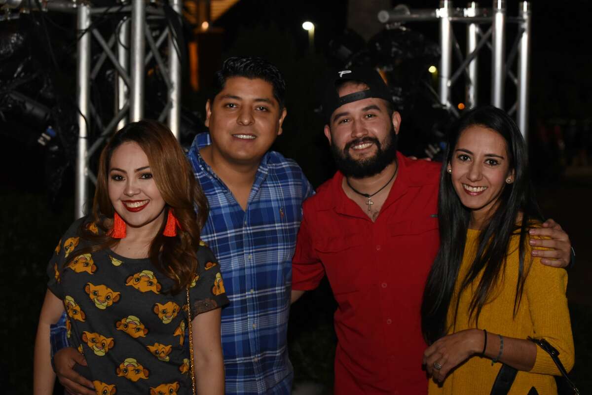 Attendees pose for a photo during the Caifanes concert.