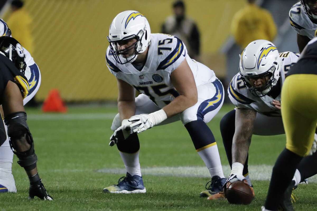 Los Angeles Chargers offensive guard Michael Schofield (75) plays during the second half of an NFL football game against the Pittsburgh Steelers in Pittsburgh, Sunday, Dec. 2, 2018. The Chargers won 33-30. (AP Photo/Gene J. Puskar)