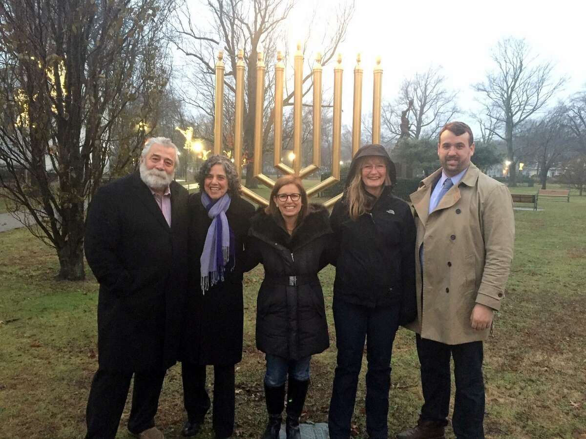 Rabbi Rona Shapiro, second from left, with, from left, state Rep. Charles Ferraro, state Sen. Gayle Slossberg, Mayor Nancy Rossi and Councilman Aaron Charney, D-3.