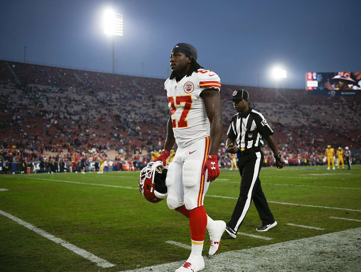 Kansas City Chiefs running back Kareem Hunt walks off the field prior to an NFL football game against the Los Angeles Rams Monday, Nov. 19, 2018, in Los Angeles. (AP Photo/Kelvin Kuo)