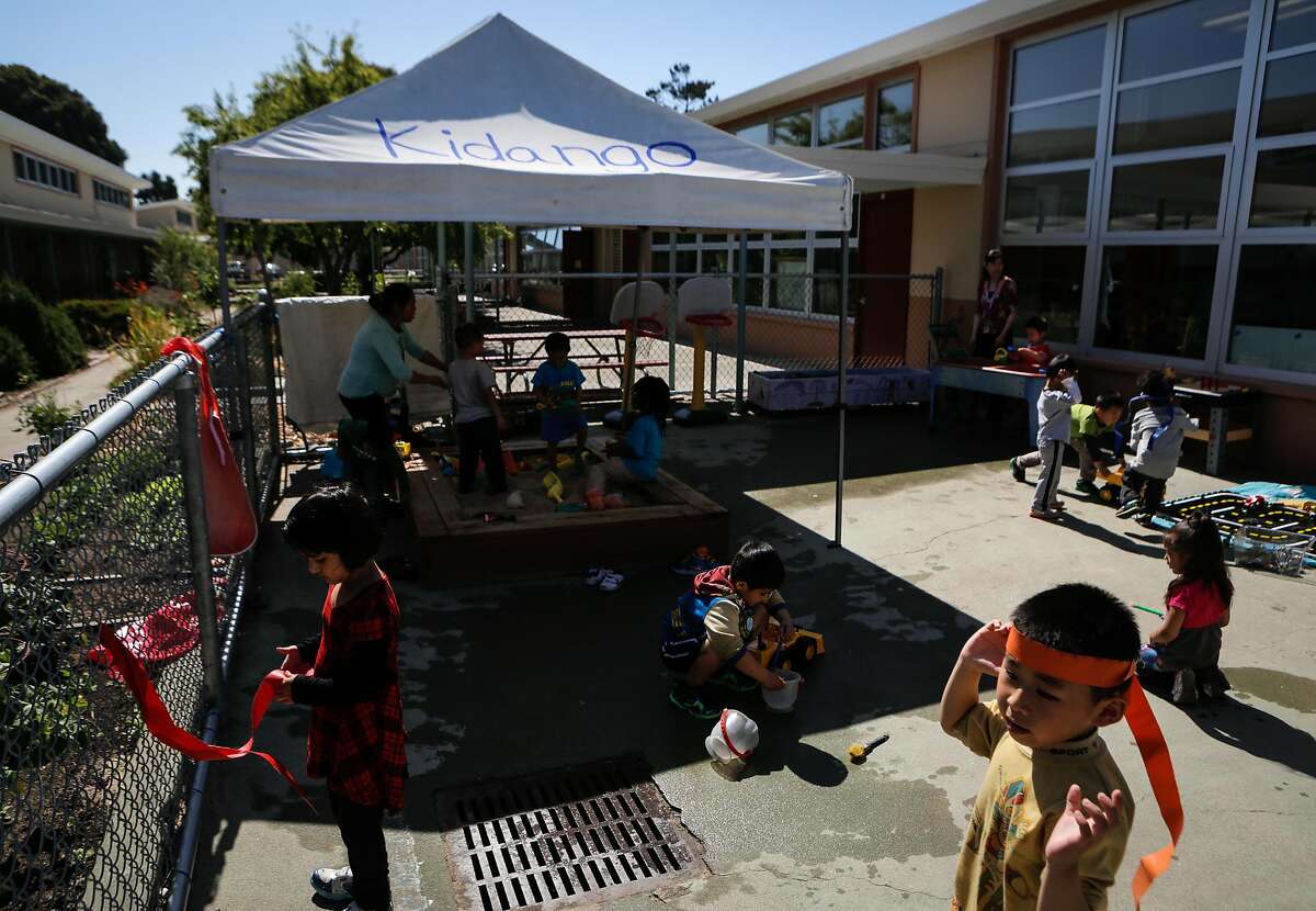 Students play during a Kidango preschool session at Corvallis Elementary School in San Lorenzo, California, on Friday, June 12, 2015. Kidango operates a year-round preschool at Corvallis Elementary. California lawmakers will vote Monday on a state budget that includes expanding subsidized preschool.