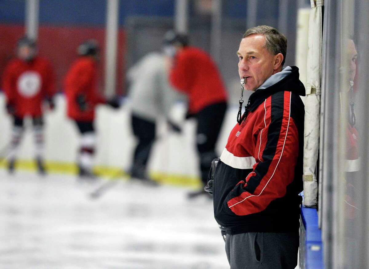 Albany Academy hockey coach Dave Riderwatches players during practice Friday Nov. 30, 2018 in Albany, NY. (John Carl D'Annibale/Times Union)