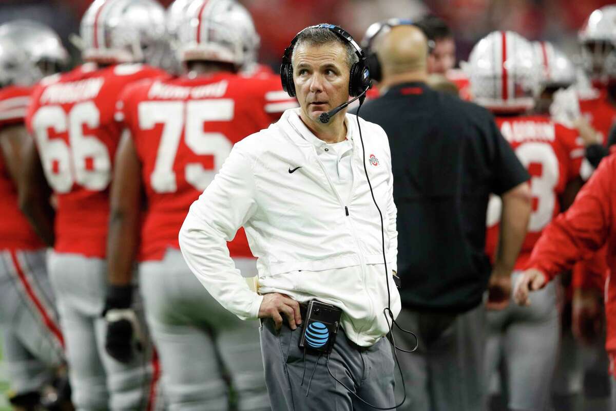 INDIANAPOLIS, INDIANA - DECEMBER 01: Head coach Urban Meyer of the Ohio State Buckeyes looks up at the score board against the Northwestern Wildcats in the fourth quarter at Lucas Oil Stadium on December 01, 2018 in Indianapolis, Indiana.