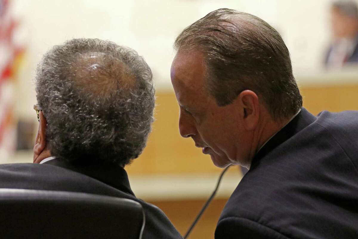 Special prosecutors Brian Wice, right, talks with Kent Schaffer during a pre-trial motion hearing in the Texas Attorney General Ken Paxton case at the Collin County courthouse on Tuesday, Dec. 1, 2015, in McKinney, Texas. Both are special prosecutors tapped to build a case against Paxton but have not been paid by the county since 2016. (Jae S. Lee/The Dallas Morning News)