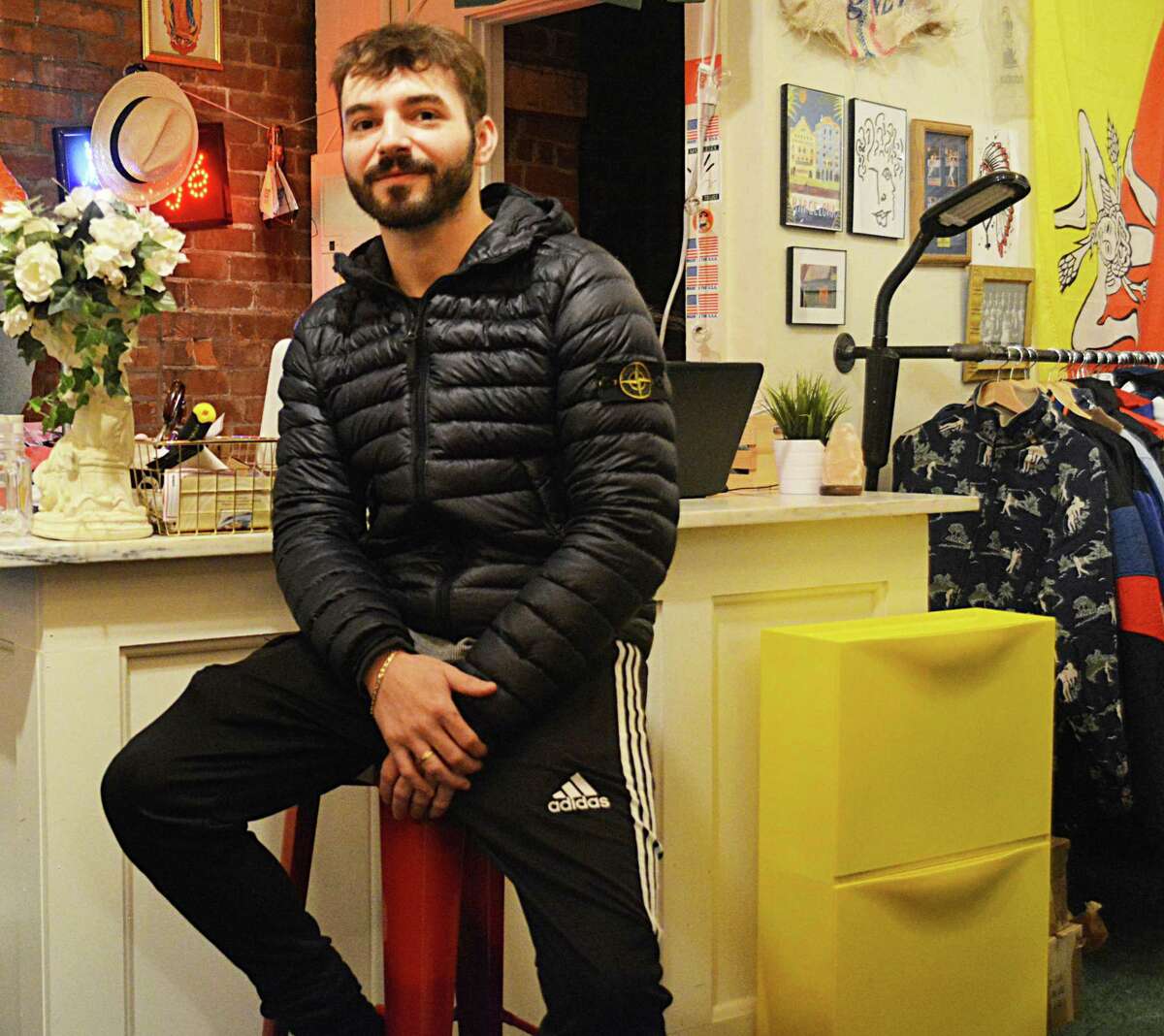 Middletown’s First Twelve urban clothing boutique in Main Street Market is run by Middletown High School and Central Connecticut State University graduate Dillon Milardo, 25, who began the business venture with the help of his college roommate Dave Ambrose. The company is rooted in their college days, when Milardo took every item out of his dorm room closet and filled it with First Twelve merchandise, creating a “pop-up” shop where his classmates could buy items on the spot.