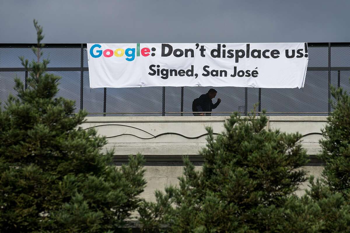 A sign is seen on the pedestrian overpass near Google's headquarters in Mountain View, Calif. on Wednesday, June 6, 2018. A new economic analysis argues that without affordable housing development, Google's new campus in San Jose will result in dramatic increases in housing costs.
