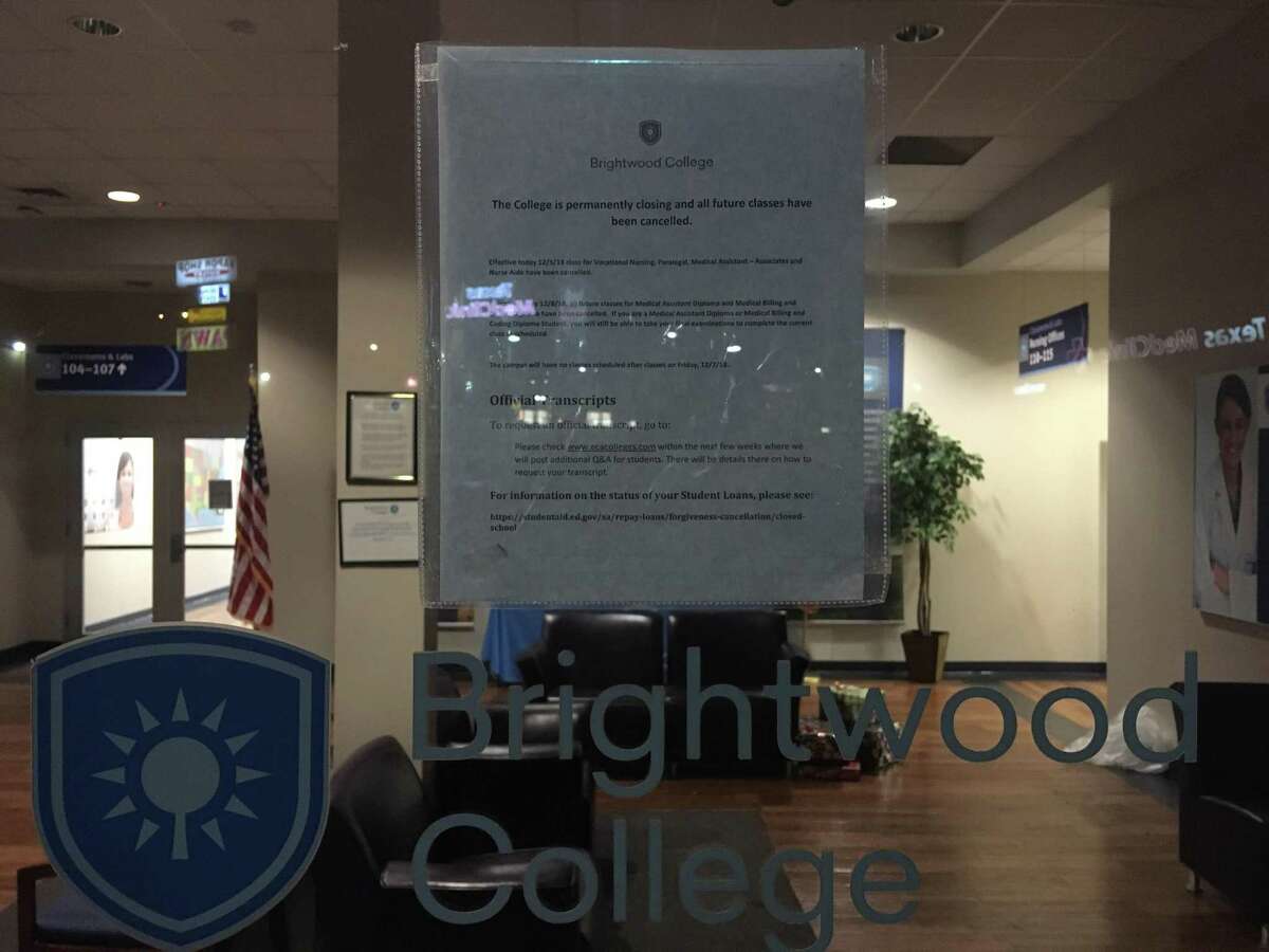 A sign on the door of Brightwood College’s campus near Ingram Park Mall said no classes would be held there after Friday. The for-profit school taught in a variety of medical and health fields. Its parent corporation is closing more than 75 schools in 18 states.