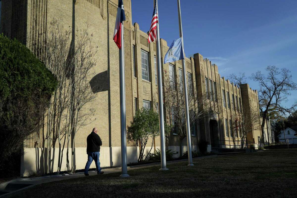 Chris Kehl walks into the Navasota ISD building to meet with the mayor and district superintendent, Wednesday, Dec. 5, 2018, in Navasota. The school district plans to release students to watch the funeral train for former President George H. W. Bush pass through the town.