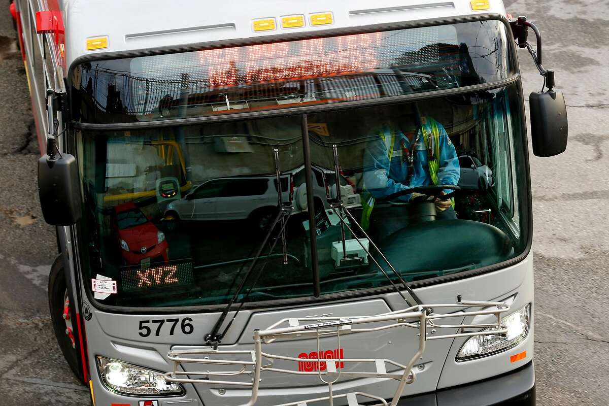 The sign reads "New bus in test No passengers" on a bus at the MUNI Potrero Division yard on Wednesday, Dec. 5, 2018, in San Francisco, Calif.