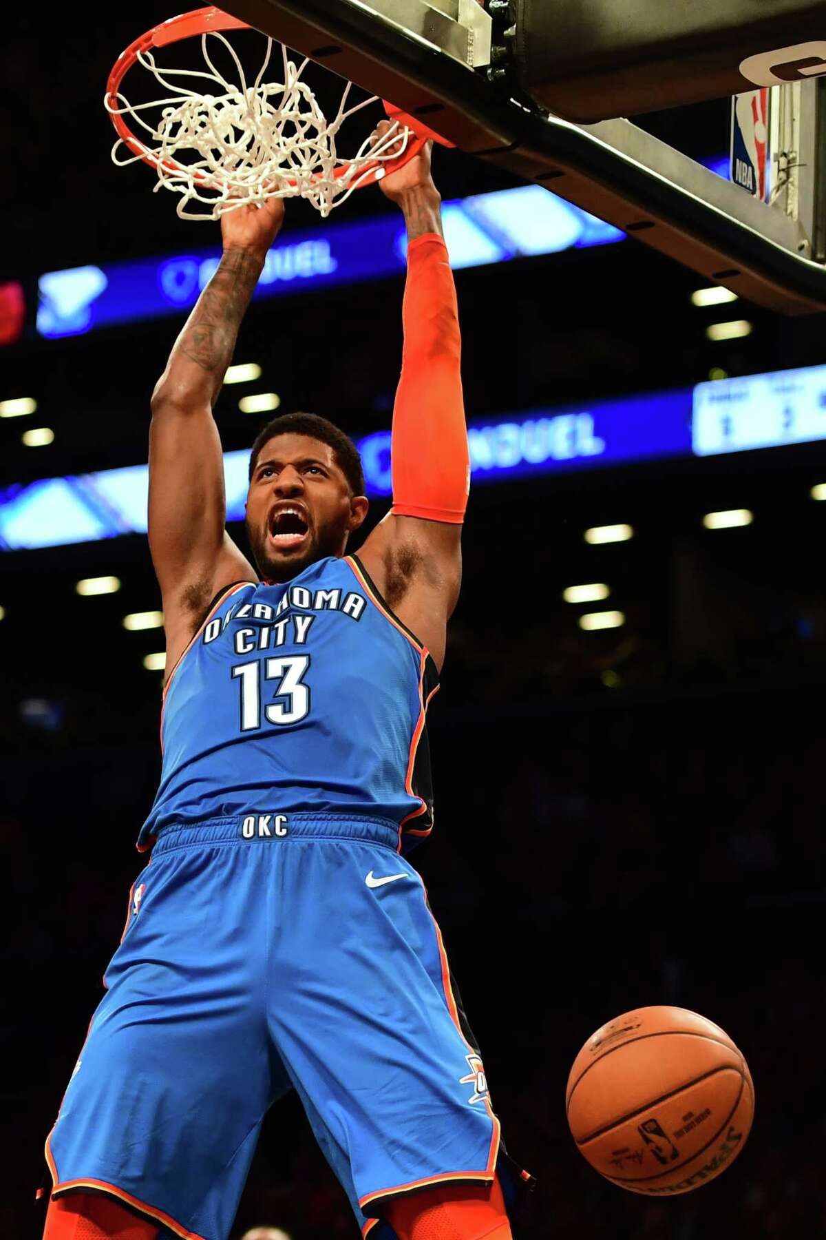 NEW YORK, NEW YORK - DECEMBER 05: Paul George #13 of the Oklahoma City Thunder reacts after making a slam dunk during the fourth quarter of the game against Brooklyn Nets at Barclays Center on December 05, 2018 in New York City. NOTE TO USER: User expressly acknowledges and agrees that, by downloading and or using this photograph, User is consenting to the terms and conditions of the Getty Images License Agreement. (Photo by Sarah Stier/Getty Images)