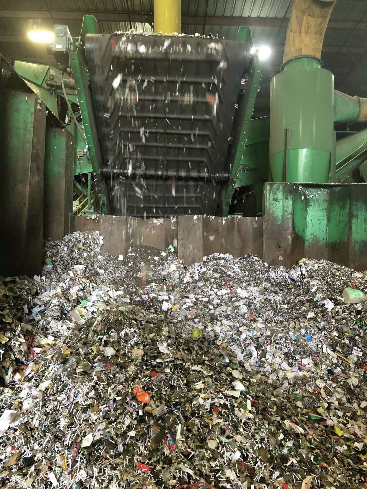 Recycled glass is processed at a local recycling facility. Small items gets mixed with the glass, contaminating it and reducing its market value.