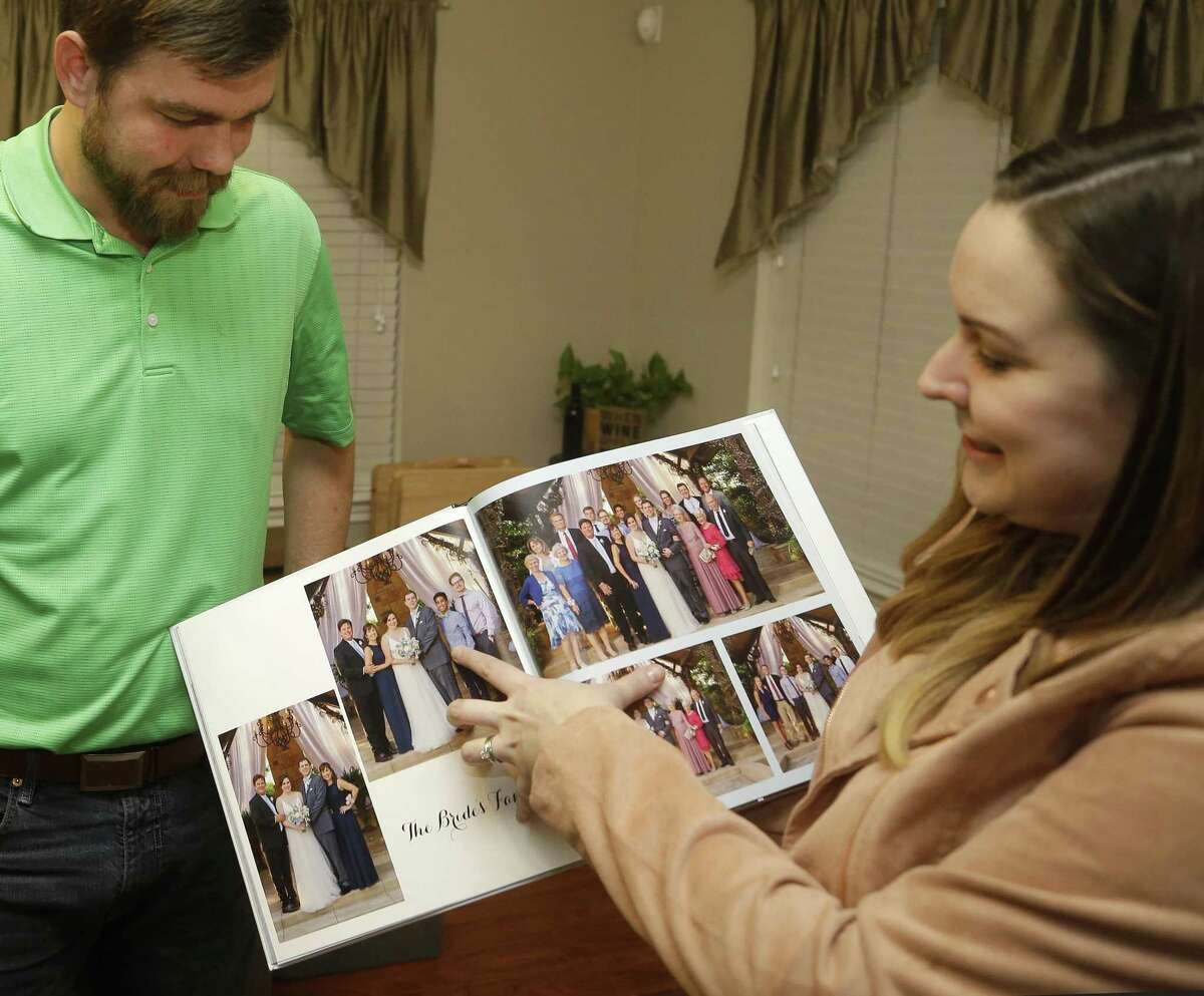 Mason Hyde and his wife, Kelly Hyde, talk about their 2016 wedding shown at their home Monday, Nov. 26, 2018, in Spring. They met while attending Texas A&M. Millennials are getting divorced at a way lower rate than previous generations, and according to sociologists, this means that divorce will continue to trend downward in recent years.