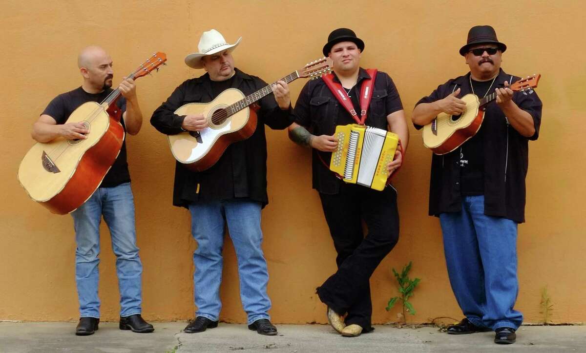 Max Baca (second from left), with his band Los Texmaniacs, says he has to work to pay his bills. The other band members are Noel Hernandez (from left), Josh Baca (accordion) and Lorenzo Martinez.