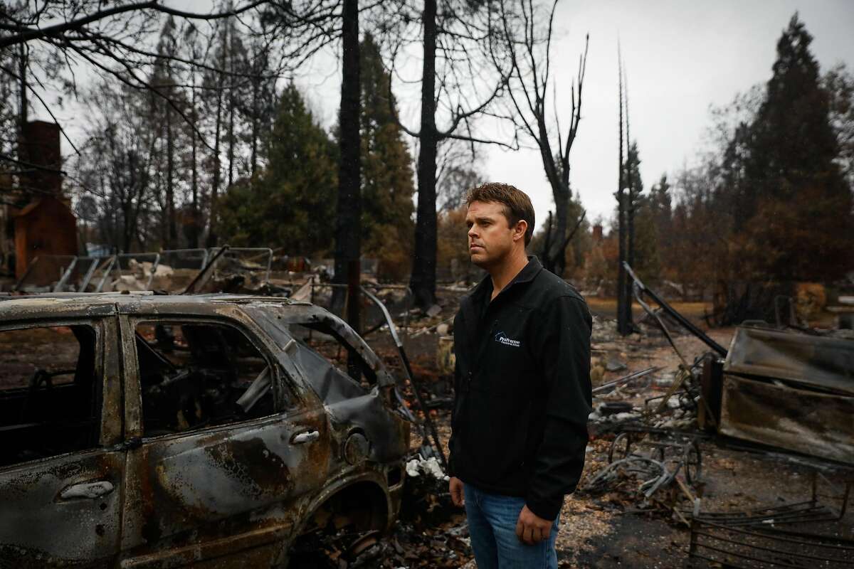 Ben Eckstrom, a Chico contractor and head of the Valley Contractors Exchange stands for a portrait in a destroyed area of Paradise, California, on Thursday, Nov. 29, 2018.