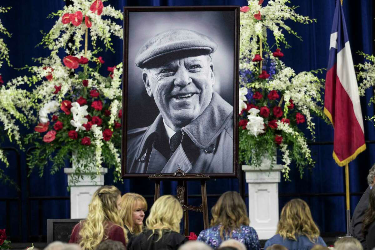 A portrait of Houston Texans founder Robert C. McNair is placed on stage during a public celebration of his life at NRG Stadium, Friday, Dec. 7, 2018, in Houston. McNair, who brought the NFL back to Houston after the Oilers left for Tennessee, died on Nov. 23 at the age of 81.