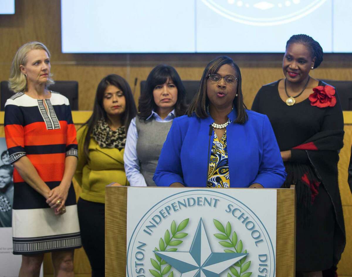 Houston Independent School District trustees (LtoR) Sue Deigaard, Elizabeth Santos, Diana Dávila and Wanda Adams listen as Grenita Lathan addresses the media during a press conference at the Hattie Mae White Educational Support Center, Monday, Oct. 15, 2018 in Houston.