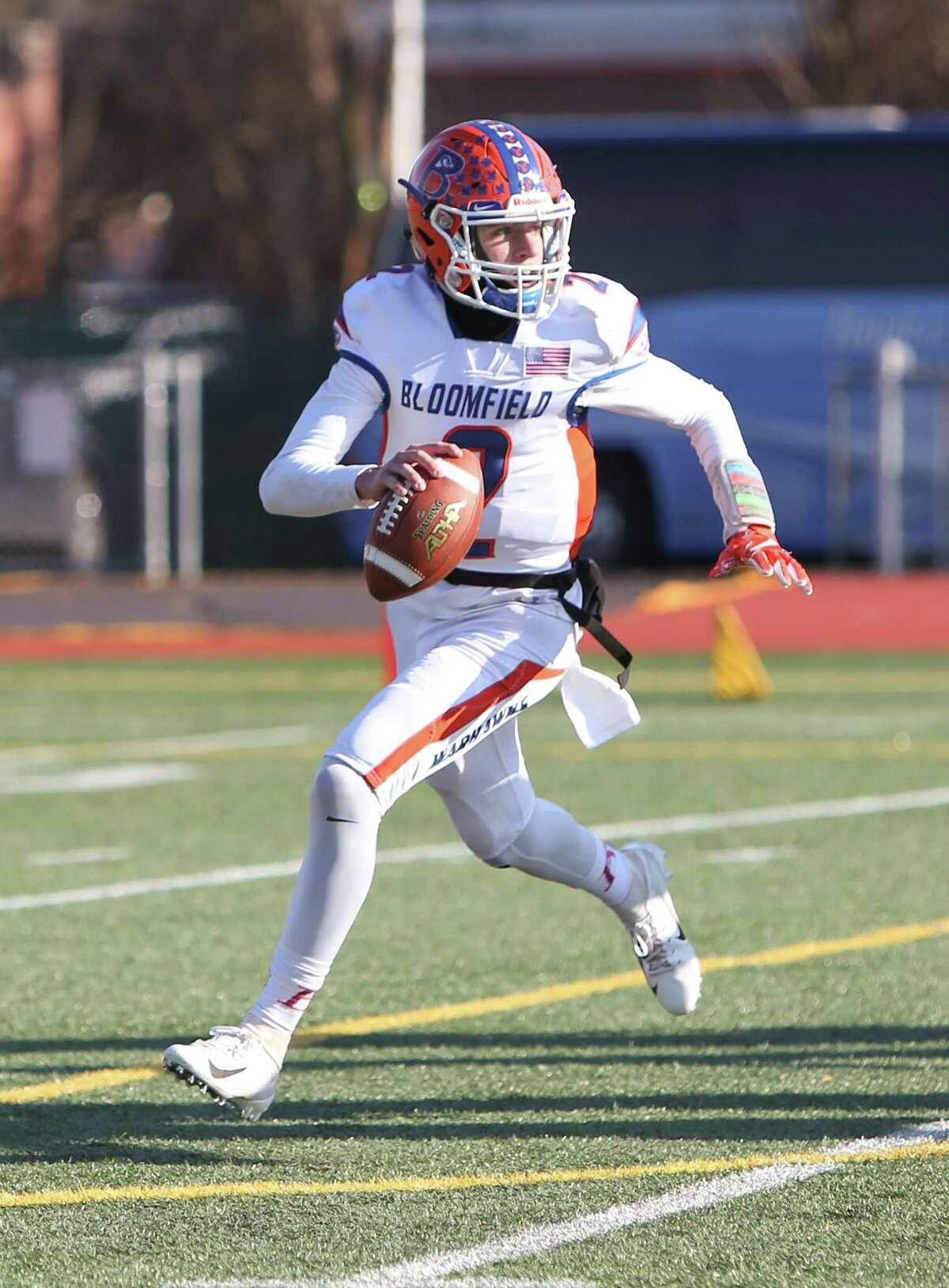 Bloomfield High School quarterback Daron Bryden throws on the move during the Class S Championship Game in New Britain against Haddam-Killingworth High School on Saturday, Dec. 8, 2018.