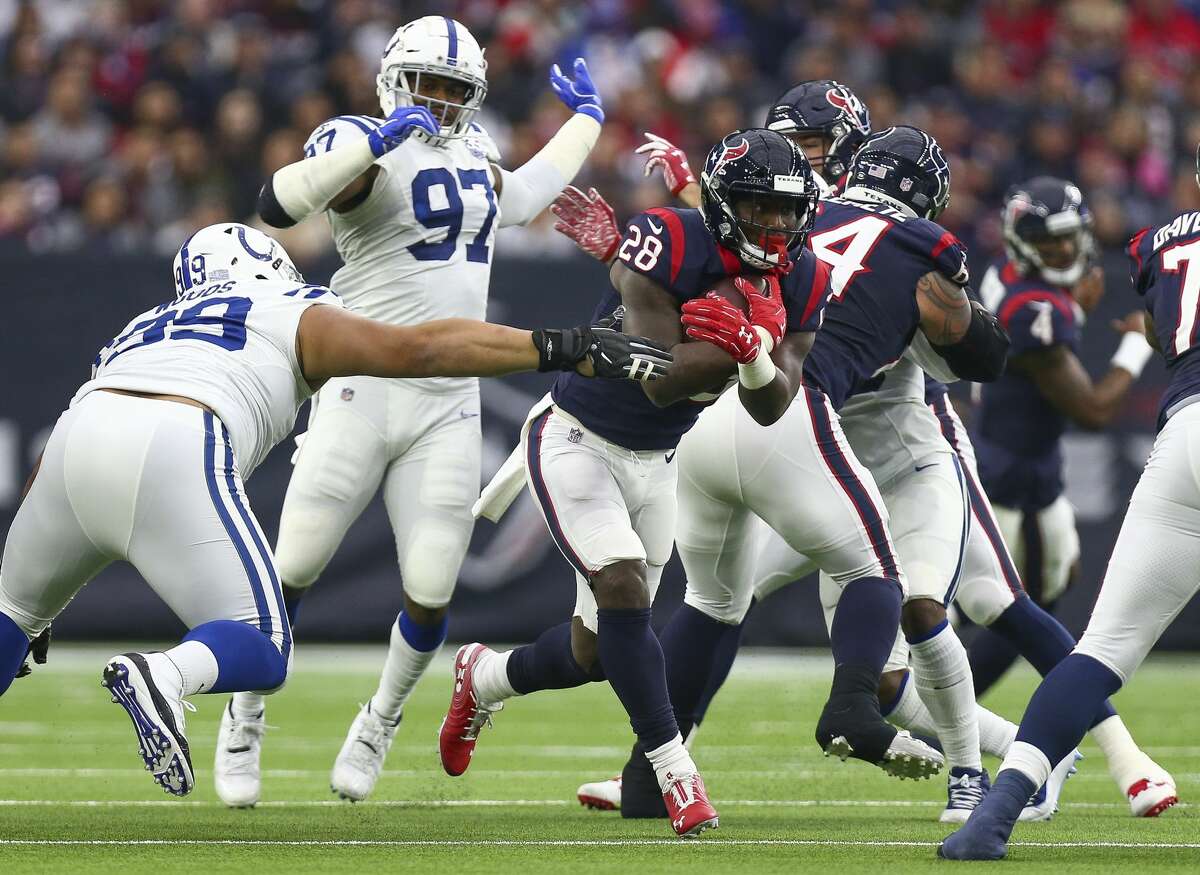 Houston Texans running back Alfred Blue (28) rushes the ball against the Indianapolis Colts during the first quarter of an NFL game at NRG Stadium Sunday, Dec. 9, 2018, in Houston. The Colts won 24-21.