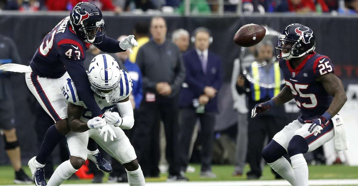 Houston Texans defensive back Shareece Wright (43) breaks up a pass intended for Indianapolis Colts wide receiver Chester Rogers (80) during the second quarter of an NFL football game at NRG Stadium, Sunday, Dec. 9, 2018, in Houston.