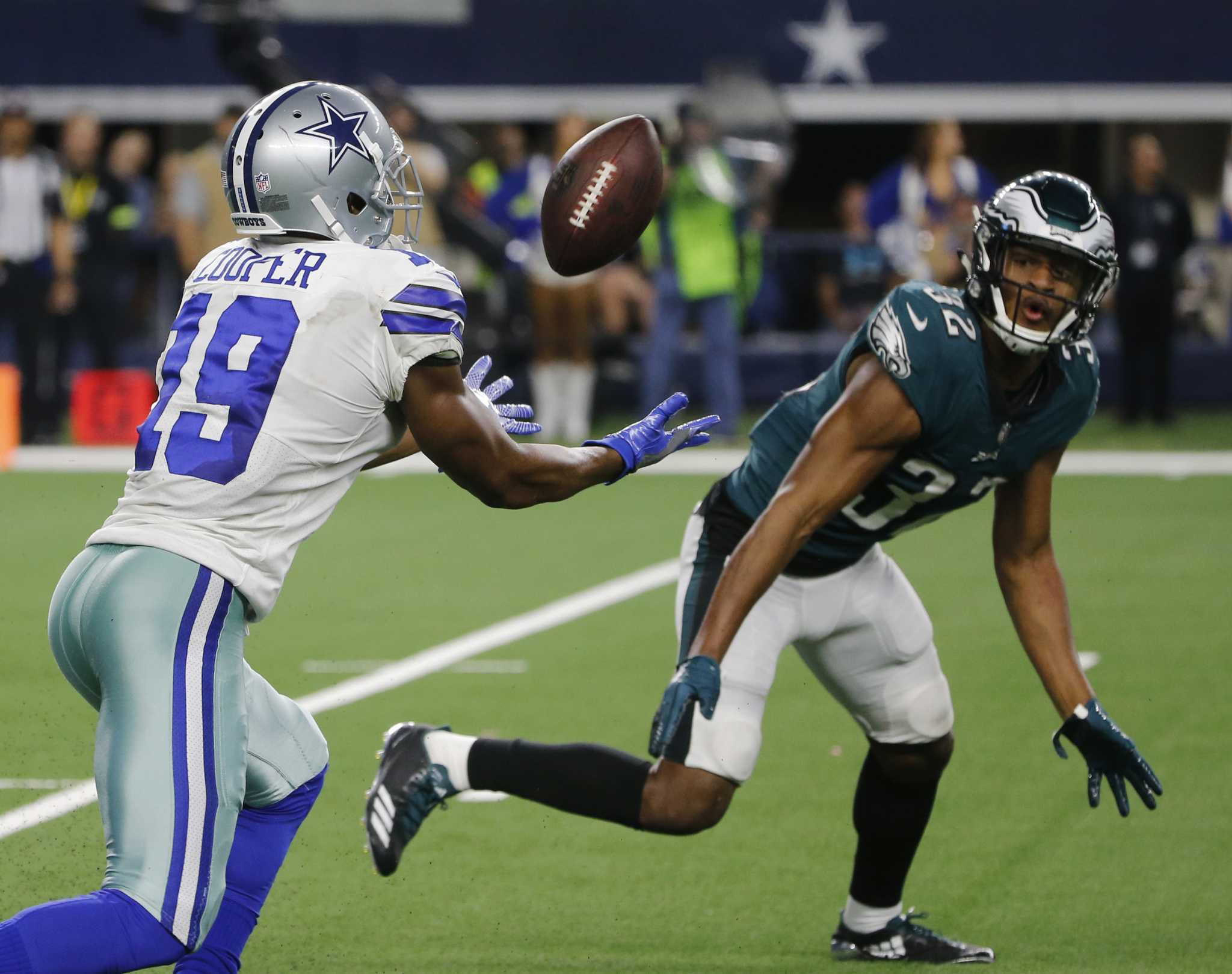 End Racism and the Dallas Cowboys logo are displayed on the end zone during  an NFL football game between the Dallas Cowboys and the San Francisco 49ers  in Arlington, Texas, Sunday, Dec.