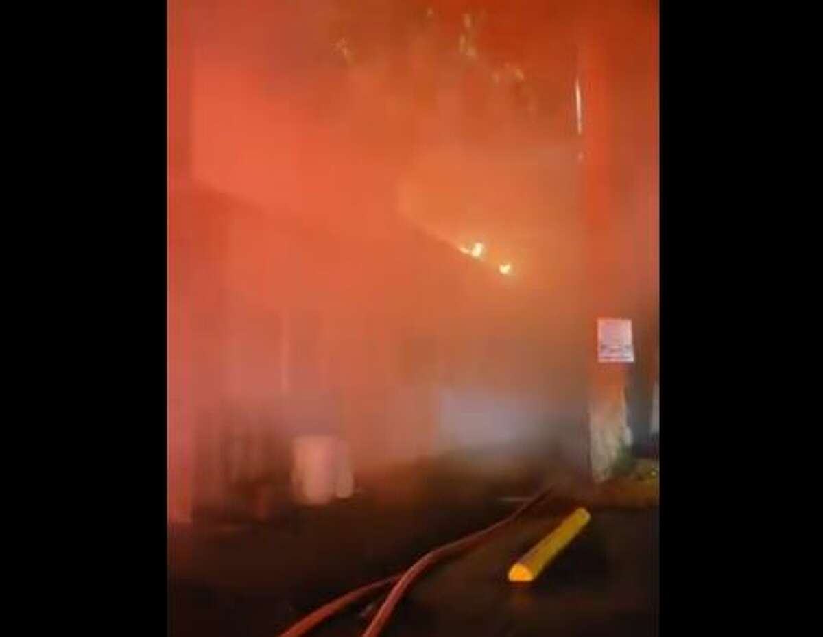 Crews fight fire inside Bellevue car wash Monday morning