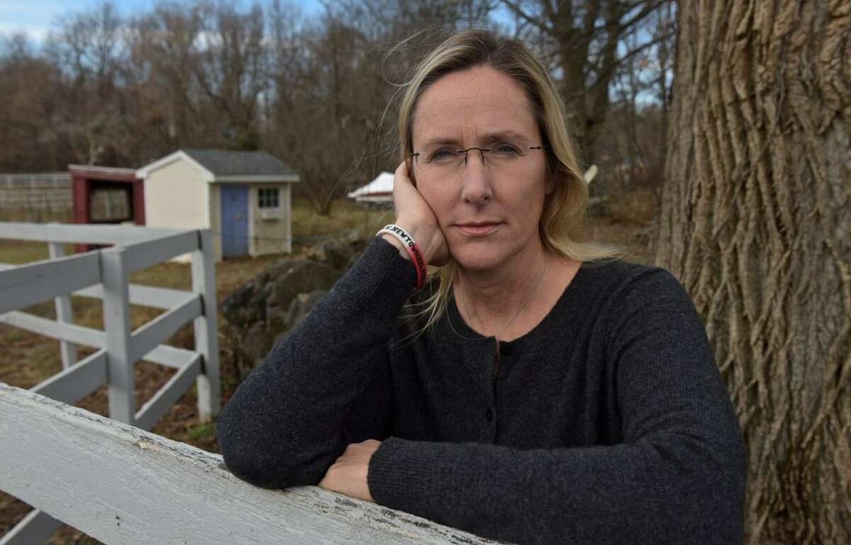Scarlett Lewis stands in the yard of her Sandy Hook home. Lewis lost her son, Jesse Lewis, in the Sandy Hook School shooting.