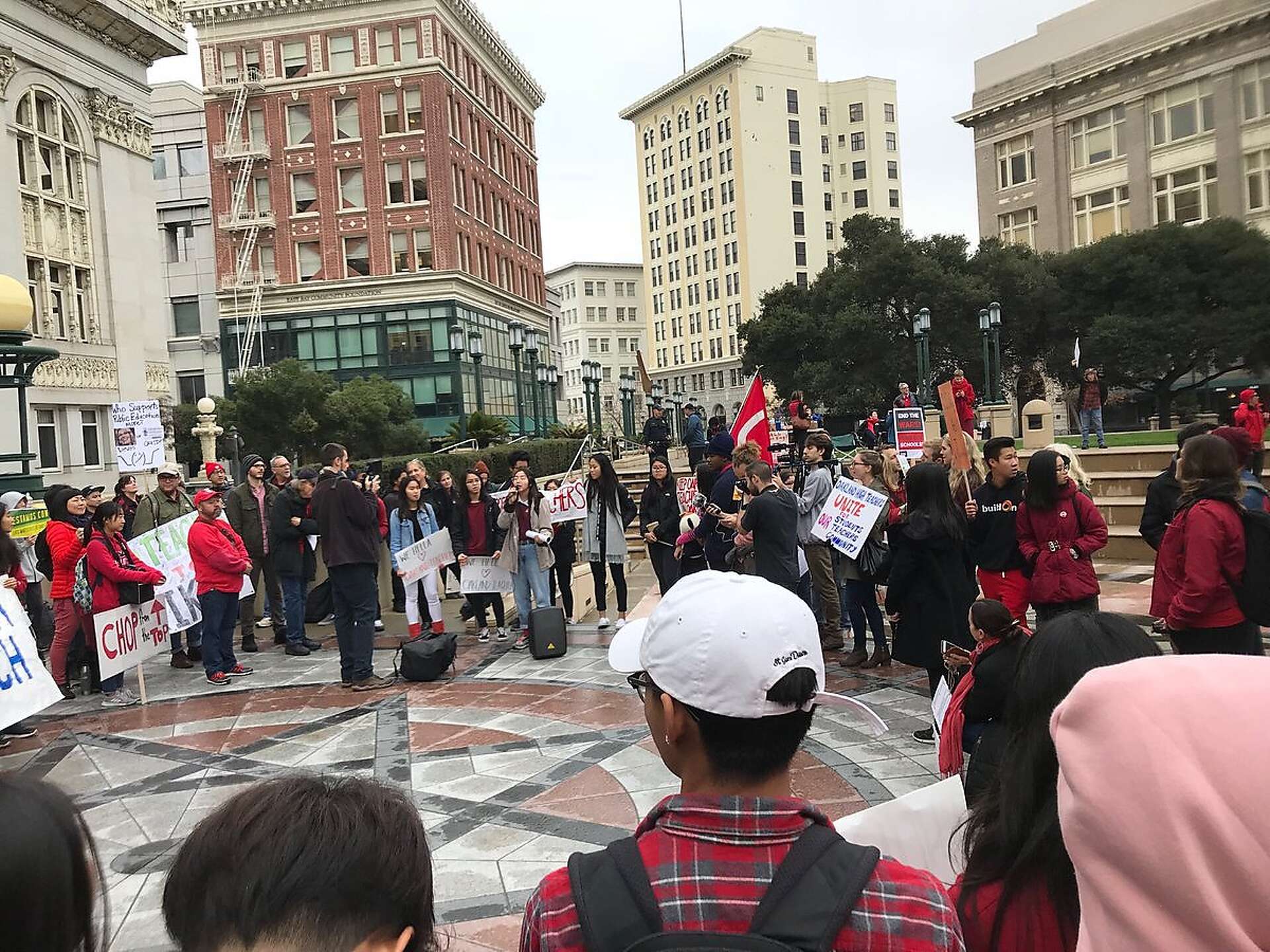 Oakland High teachers walk out to protest pay; district considers ...
