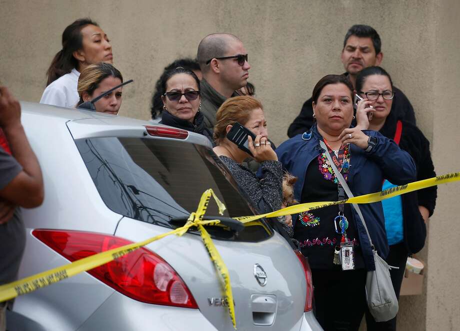 people gather outside of balboa high school after a shooter