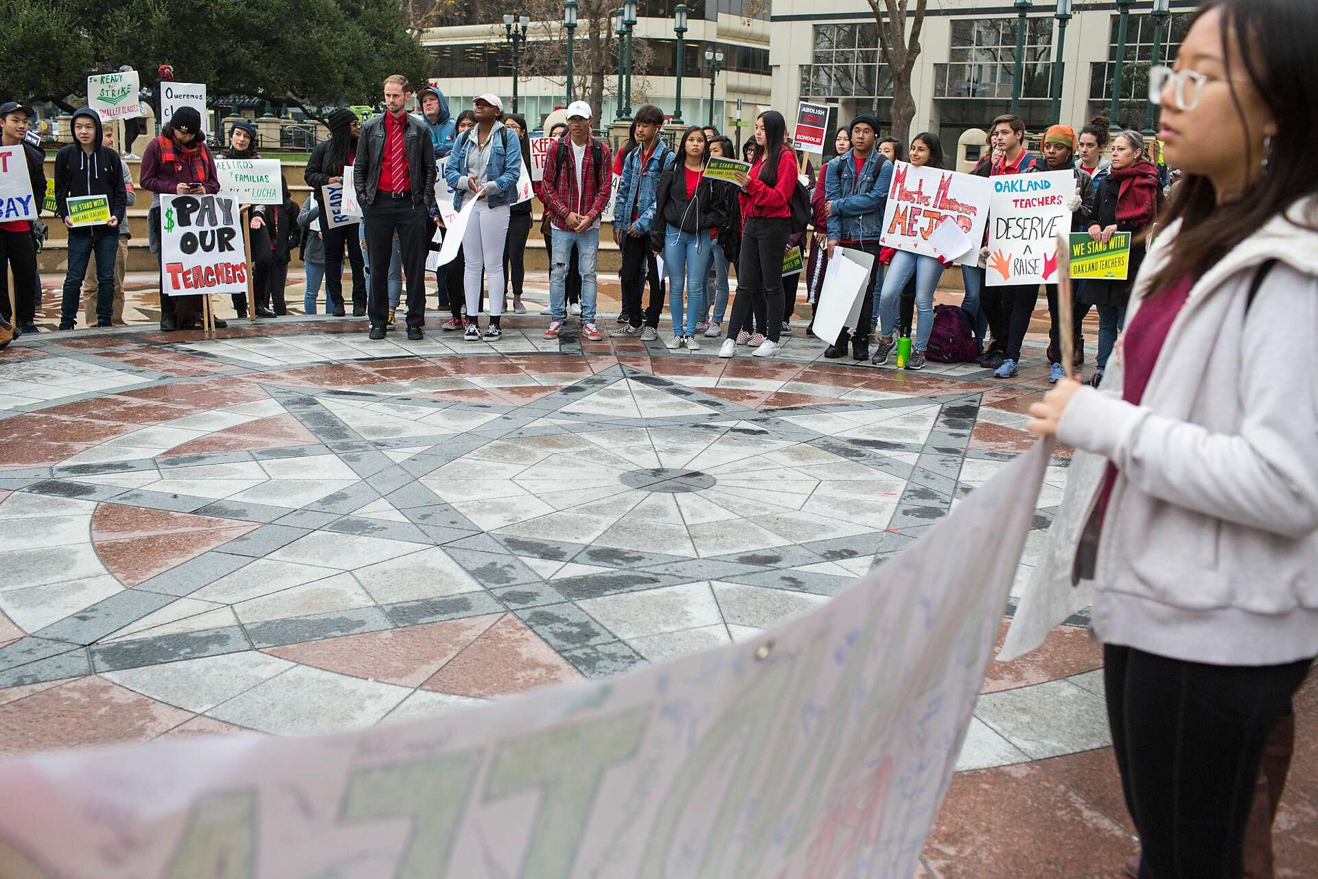 Oakland High teachers walk out to protest pay; district considers ...