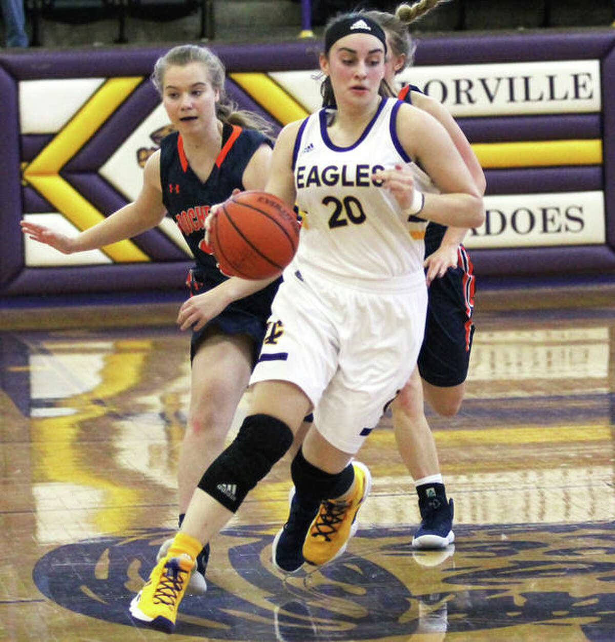CM’s Anna Hall (20), shown in action earlier this season, scored 20 points Monday night in the Eagles’ victory over the Collinsville Kahoks in Bethalto.