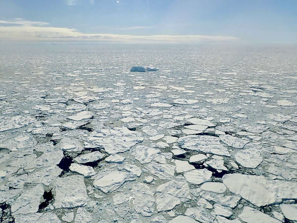 In a photo from NASA, sea ice along Greenland's coast, April 27, 2018. The Arctic has been warmer in the past five years than at any time in the modern era, scientists said. The effects can be felt far beyond the region. (Joe MacGregor/NASA IceBridge via The New York Times) -- FOR EDITORIAL USE ONLY
