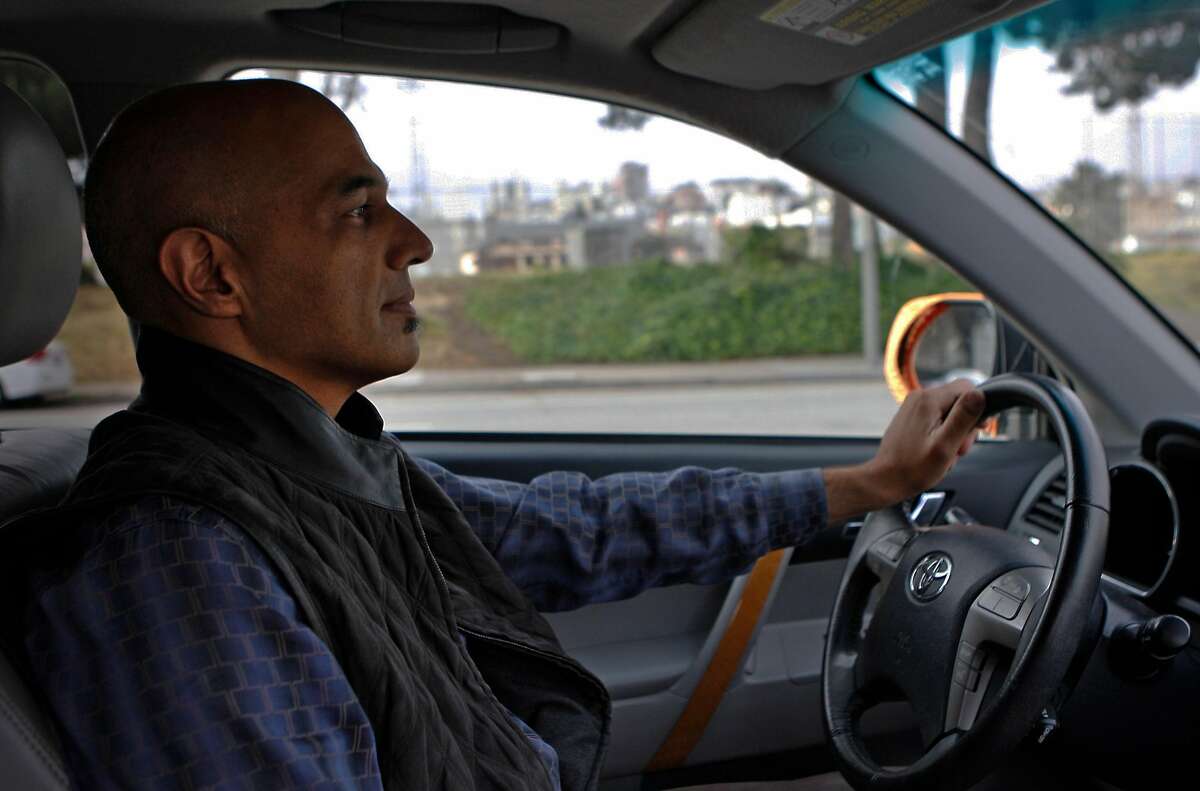 Sidecar co-founder and CEO Sunil Paul heads to the Marina in San Francisco, Calif. to pick up a Sidecar customer Friday, May 15, 2015. Paul regularly works as a driver, picking up passengers on his way to the Sidecar office where he runs the company.