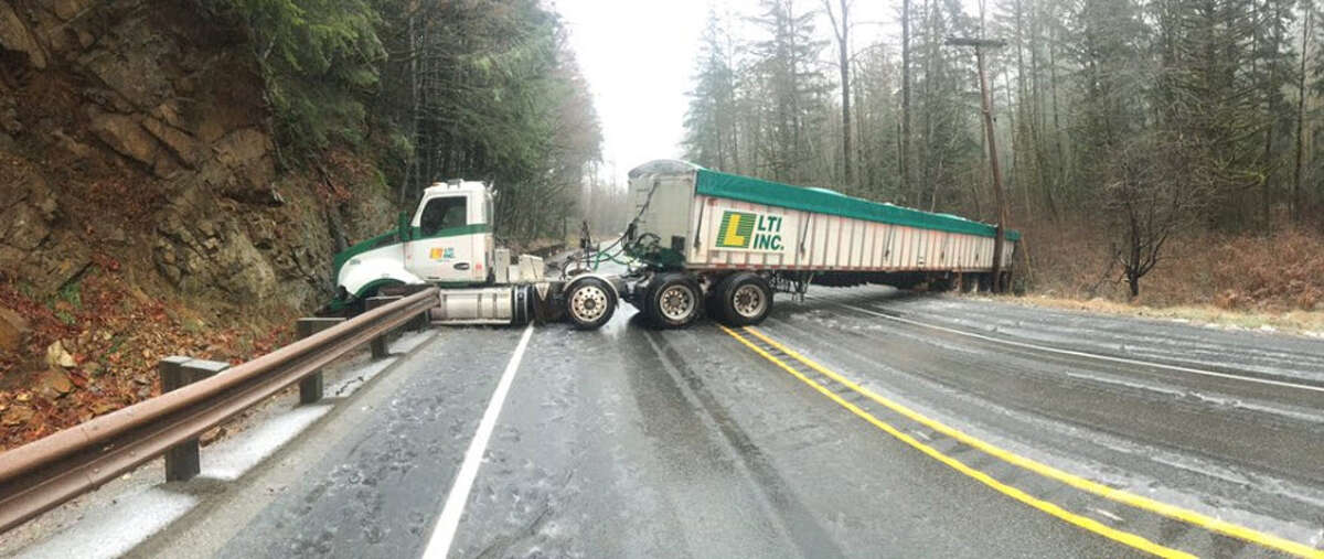 A tractor trailer jackknifed on U.S. 2 Tuesday morning, closing down the highway near Skykomish. Officials said drivers could detour through the town, but expected long delays.