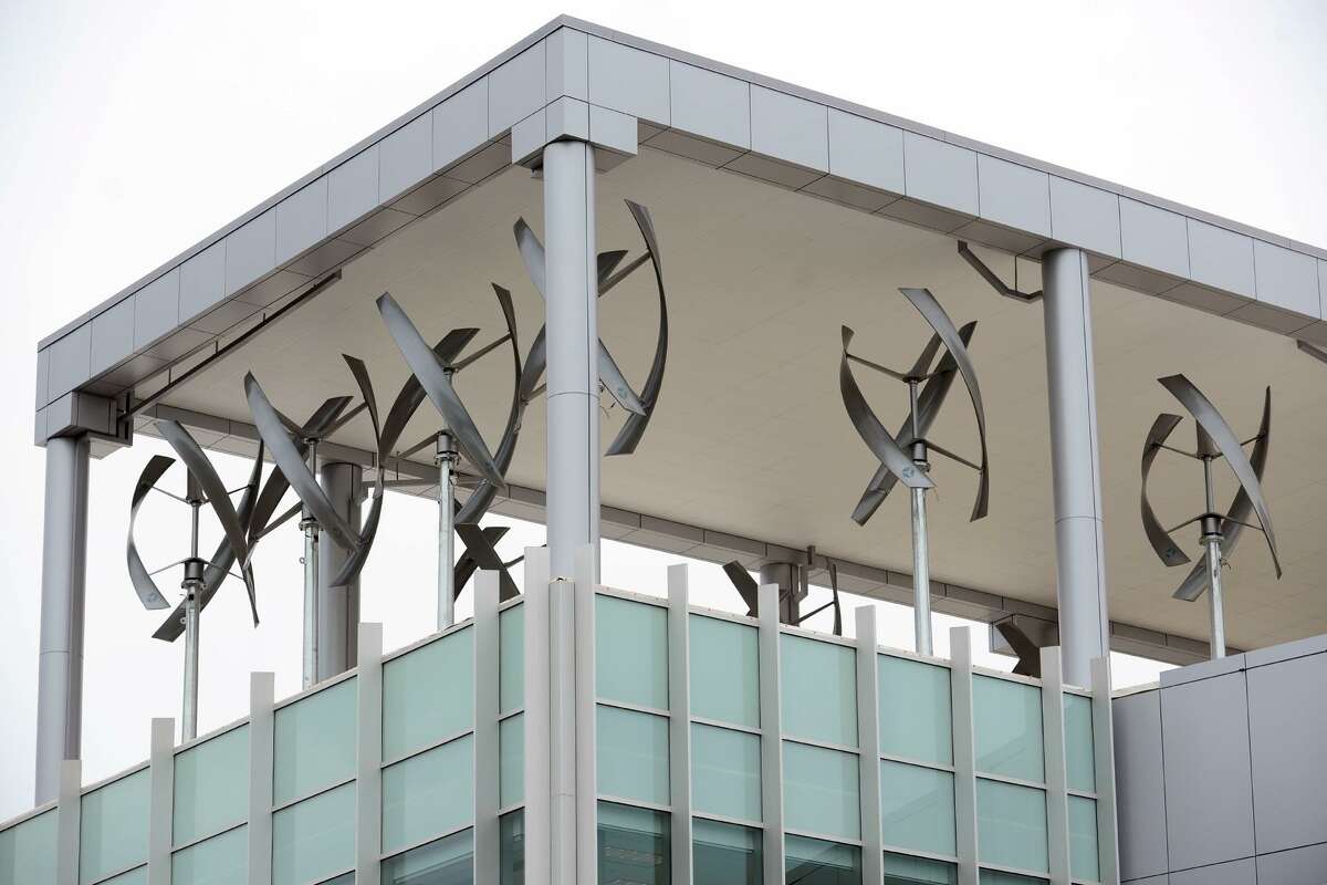 Wind turbines fill a breezeway above the main entrance to the new Fairchild Wheeler Interdistrict Magnet School Campus, in Bridgeport, Conn., Aug. 19, 2013. The turbines will provide suplimental electricity that will be used in the school.