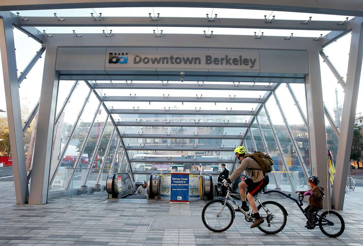 A glass staircase remains closed to the public at the main entrance Downtown Berkeley BART station in Berkeley, Calif. on Tuesday, Dec. 11, 2018. A new glass canopy and stairway opened recently after an extensive redesign but a commuter fell on the steps after recent rains created slippery conditions.