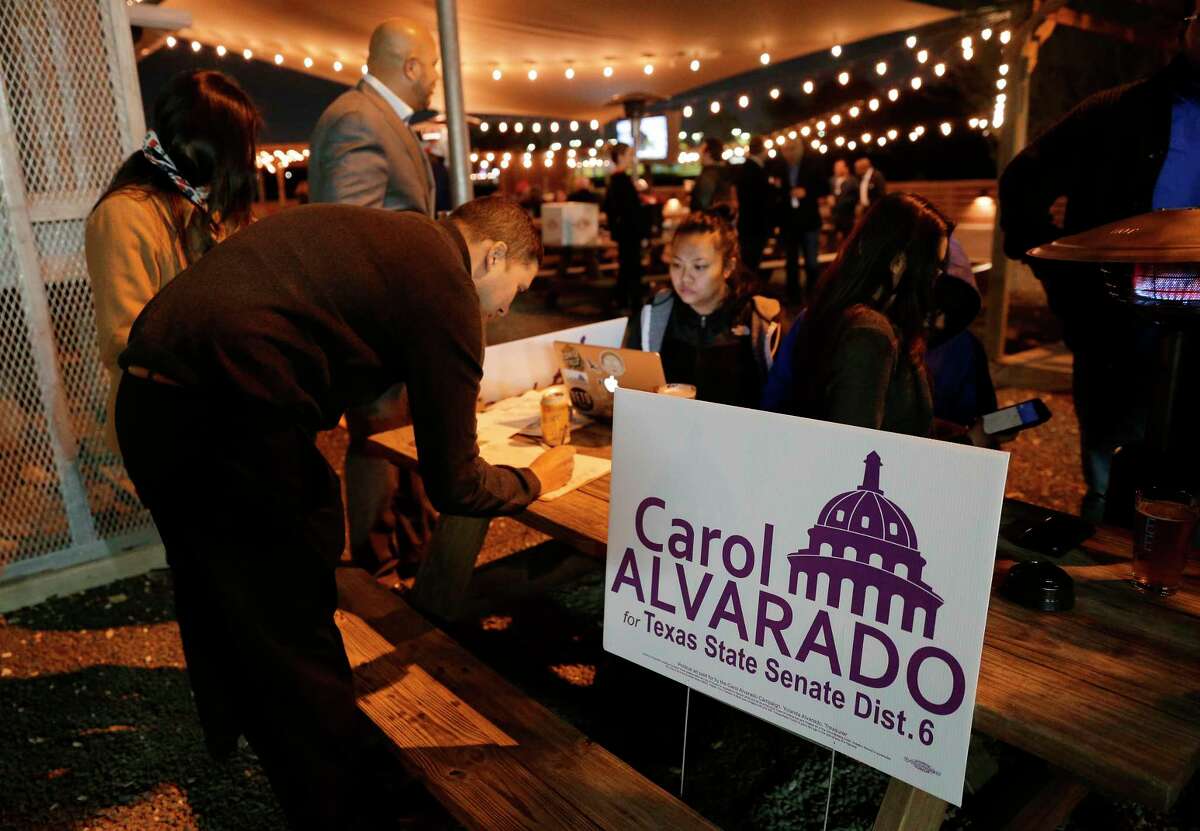 Supporters of Carol Alvarado wait outside for her to arrive at her watch party held at Raven Tower Tuesday, Dec. 11, 2018 in Houston, TX.