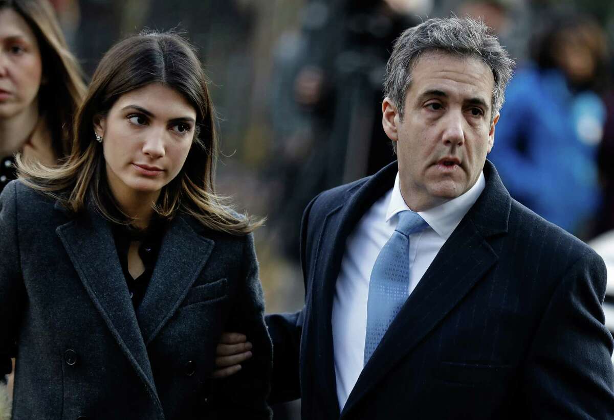 Michael Cohen, former personal lawyer to U.S. President Donald Trump, arrives at federal court with his daughter Samantha Cohen, left, in New York on Wednesday, Dec. 12, 2018.