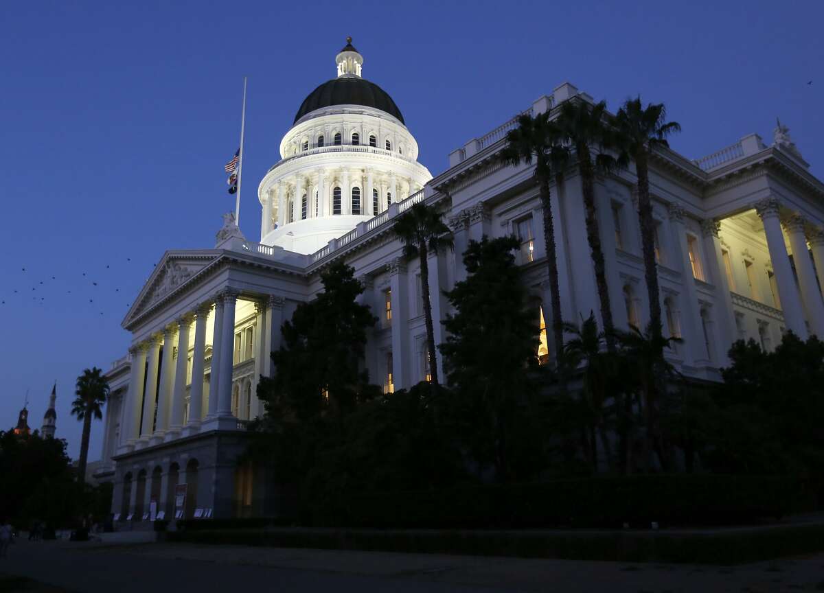 FILE -- In this Aug. 31, 2018 file photo, the lights of the Capitol dome shine as lawmakers work into the night on the last day of the 2017-2018 Legislative session, in Sacramento, Calif. California lawmakers begin their new legislative session Monday, Dec. 3, with crushing Democratic supermajorities in both legislative chambers to go with Democrats’ sweep of all statewide offices. (AP Photo/Rich Pedroncelli, File)