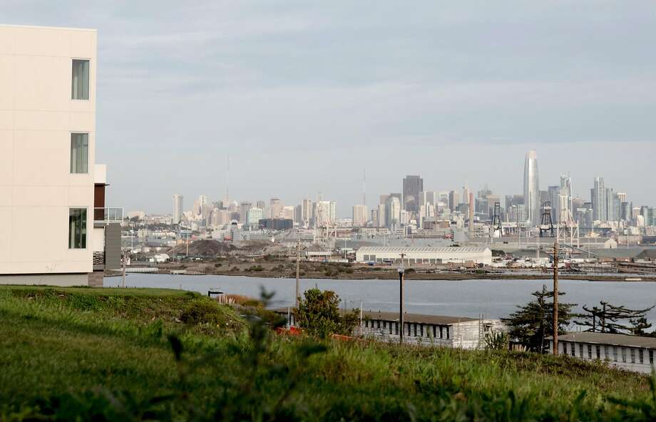 A newly-constructed housing development on Parcel A looks out onto the San Francisco skyline in the Hunters Point Naval Shipyard in the Hunters Point neighborhood of San Francisco, Calif. Wednesday, Nov. 28, 2018. Photo: Jessica Christian / The Chronicle