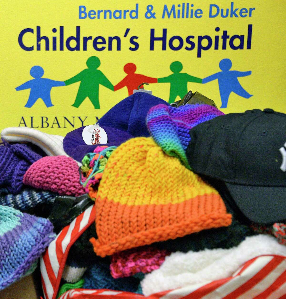 Just some of the 900 hats collected by Jeremy Wernick, 15, of Latham for patients at the Bernard & Millie Duker ChildrenOs Hospital at Albany Medical Center Wednesday Dec. 12, 2018 in Albany, NY. The hats were collected by Jeremy throughout the month of November, marking his sixth year of Hatsgiving, a project Jeremy started when he was 9 years old. (John Carl D'Annibale/Times Union)