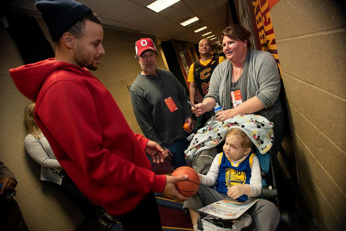 Nathaniel, 4 of Cleveland who is a cancer patient meets his Hero Stephen Curry after Wednesday nights game as the Warriors face the Cavaliers at Quicken Loans Arena in Cleveland on December 5, 2018. "A Special Wish Foundation" made this meeting possible for him to meet (Kyle Lanzer/Special to The San Francisco Chronicle)