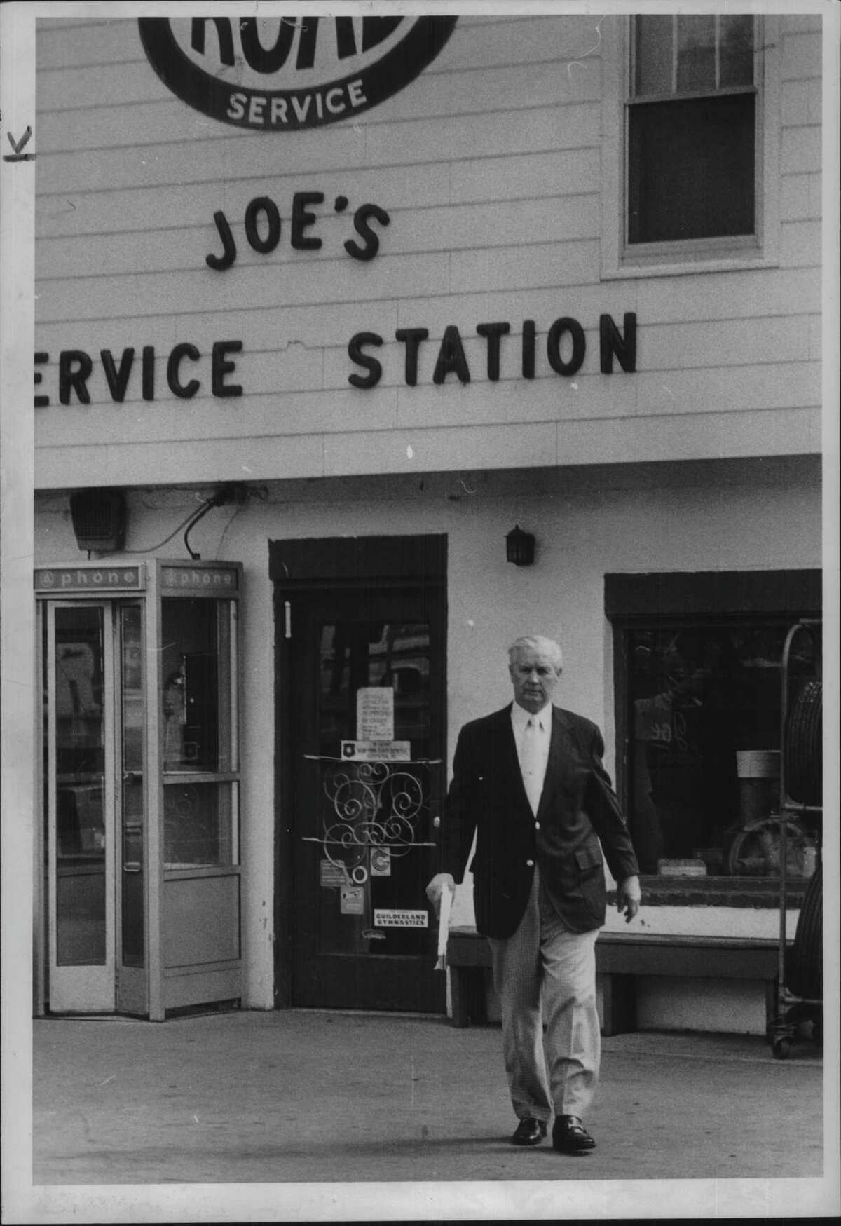 Joe's Service Station, Guilderland, New York _ Kenneth Weafer, Albany County dealer of weight and measures, leaves service station on Route 20 & 146 - Joseph Calabro, owner. June 14, 1979 (Raymond B. Summers/Times Union Archive)